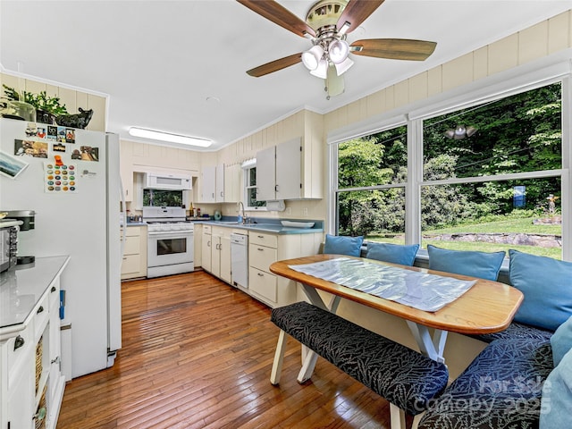 170 Twin Springs Rd, Hendersonville, NC 28792 - kitchen with white appliances, a ceiling fan, light wood finished floors, light countertops, and crown molding