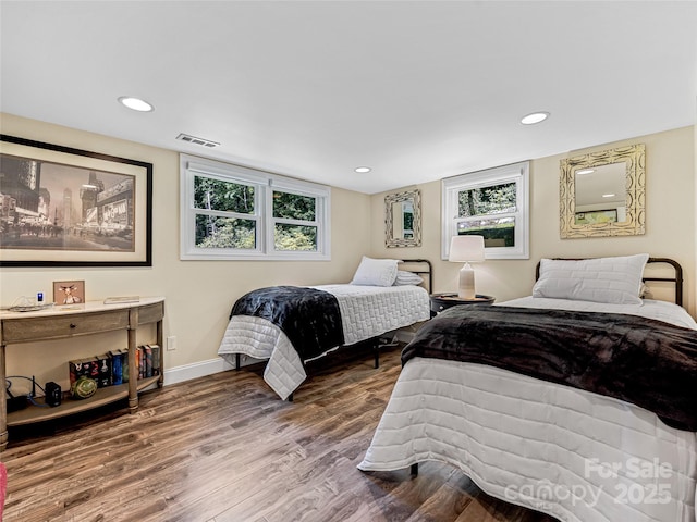 170 Twin Springs Rd, Hendersonville, NC 28792 - bedroom with wood finished floors, multiple windows, and recessed lighting