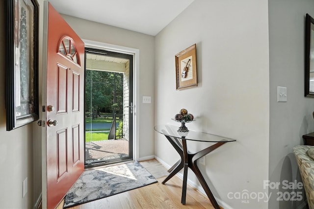 402 Walnut St Unit 11, China Grove, NC 28023 - entrance foyer featuring light wood finished floors and baseboards