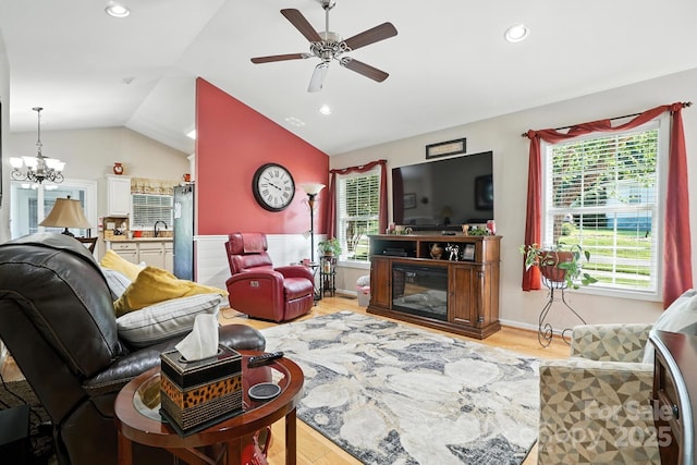 402 Walnut St Unit 11, China Grove, NC 28023 - living area with vaulted ceiling, light wood-type flooring, ceiling fan, recessed lighting, and a chandelier