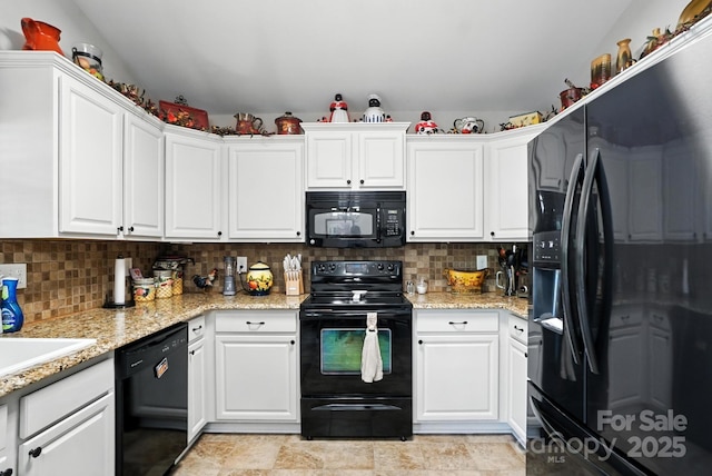 402 Walnut St Unit 11, China Grove, NC 28023 - kitchen featuring black appliances, white cabinets, and tasteful backsplash