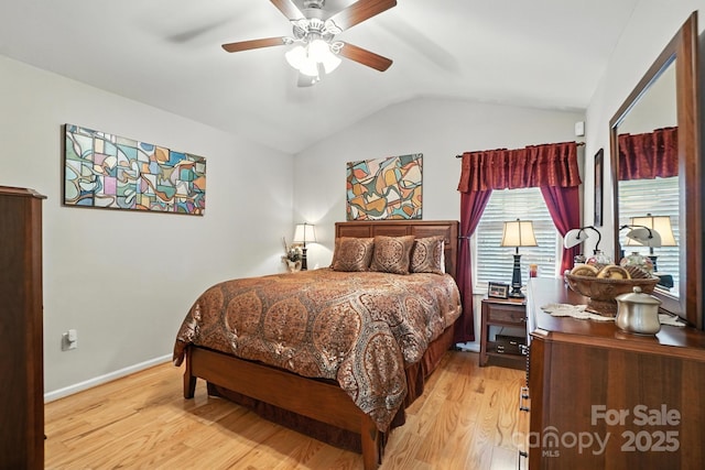 402 Walnut St Unit 11, China Grove, NC 28023 - bedroom with lofted ceiling, light wood finished floors, and a ceiling fan