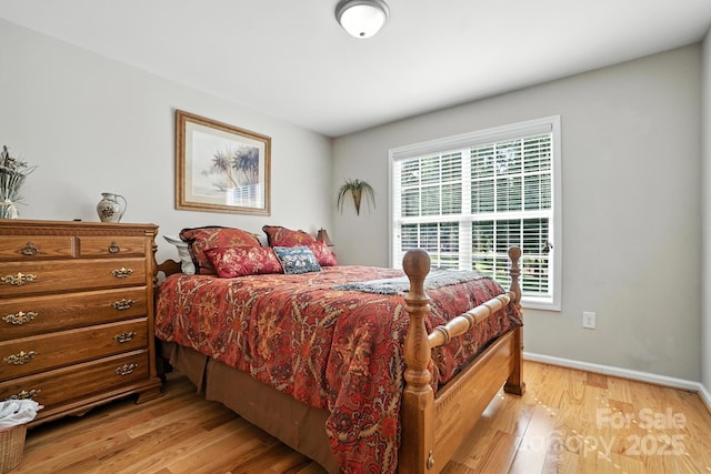 402 Walnut St Unit 11, China Grove, NC 28023 - bedroom featuring light wood finished floors and baseboards
