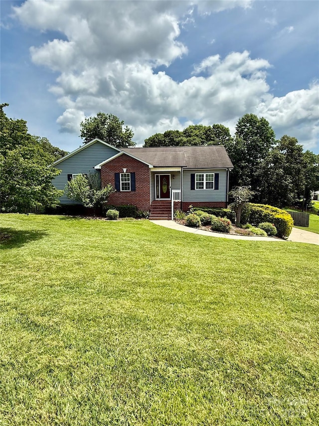 4351 Grover Pl, Granite Falls, NC 28630 - ranch-style home featuring a front yard and brick siding