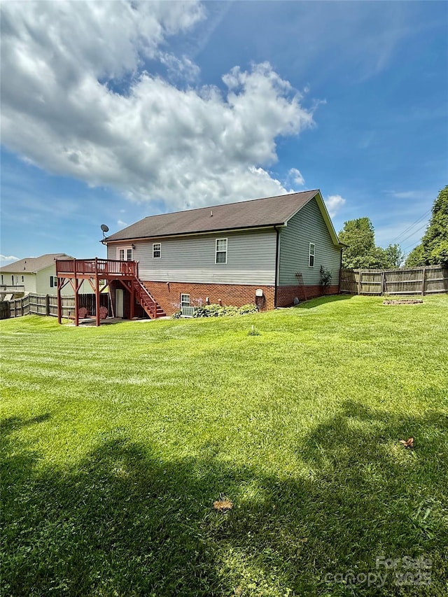 4351 Grover Pl, Granite Falls, NC 28630 - rear view of house with stairs, a wooden deck, and a fenced backyard