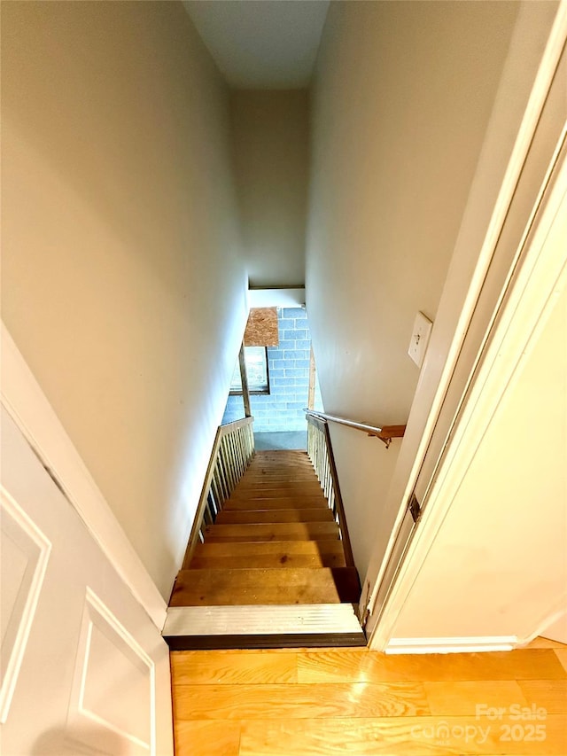 4351 Grover Pl, Granite Falls, NC 28630 - stairway featuring wood finished floors and a high ceiling