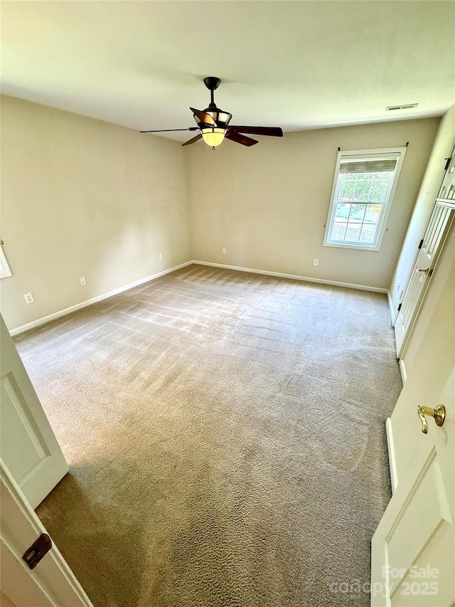 4351 Grover Pl, Granite Falls, NC 28630 - spare room featuring a ceiling fan and carpet floors