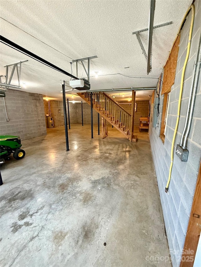 4351 Grover Pl, Granite Falls, NC 28630 - garage featuring concrete block wall and a garage door opener