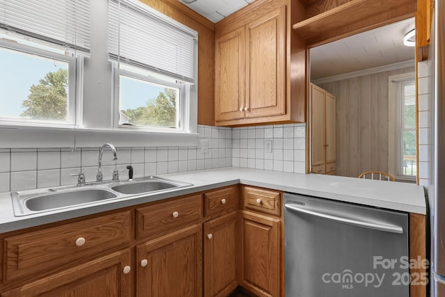 435 Stirewalt Rd, China Grove, NC 28023 - kitchen with stainless steel dishwasher, backsplash, light countertops, and brown cabinetry