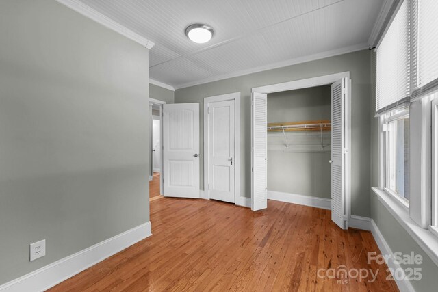 435 Stirewalt Rd, China Grove, NC 28023 - unfurnished bedroom featuring ornamental molding and wood finished floors