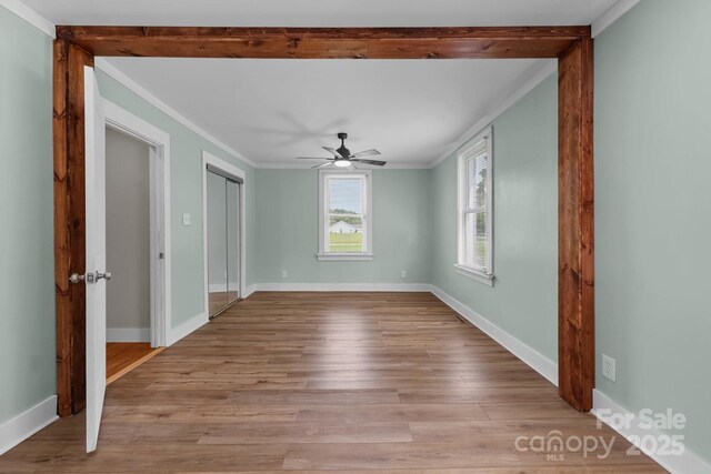 435 Stirewalt Rd, China Grove, NC 28023 - spare room with ornamental molding, a ceiling fan, and wood finished floors