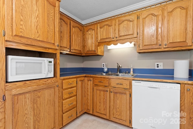 1040 Stagecoach Trl, Lenoir, NC 28645 - kitchen featuring white appliances, brown cabinetry, and ornamental molding