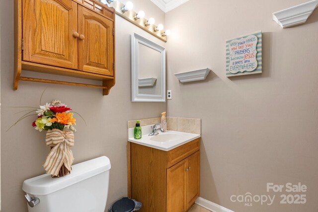 1040 Stagecoach Trl, Lenoir, NC 28645 - bathroom with vanity and ornamental molding