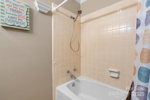 1040 Stagecoach Trl, Lenoir, NC 28645 - bathroom featuring shower / bath combo with shower curtain