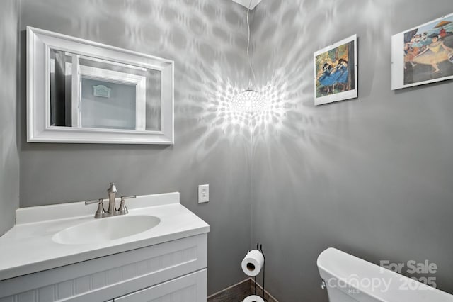 310 25th Ave NW, Hickory, NC 28601 - bathroom featuring toilet and vanity