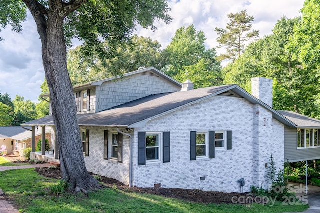 310 25th Ave NW, Hickory, NC 28601 - view of front of house featuring a chimney, brick siding, crawl space, and a shingled roof