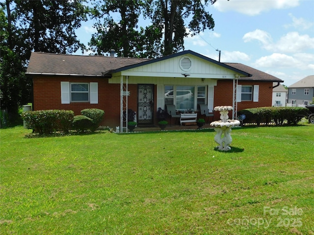 814 Aileen Cir, Pineville, NC 28134 - view of front of property with brick siding, a front lawn, and covered porch