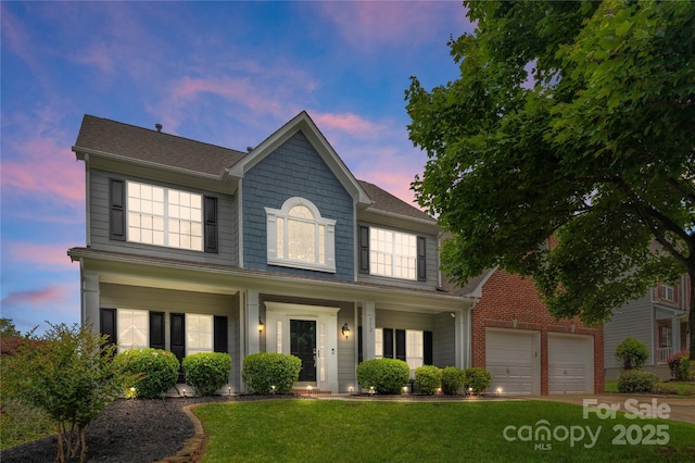 112 Steeplechase Ave, Mooresville, NC 28117 - view of front of home with a lawn, driveway, and a shingled roof