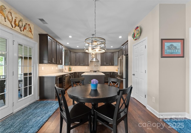 112 Steeplechase Ave, Mooresville, NC 28117 - dining area featuring dark wood-style floors, a chandelier, and recessed lighting