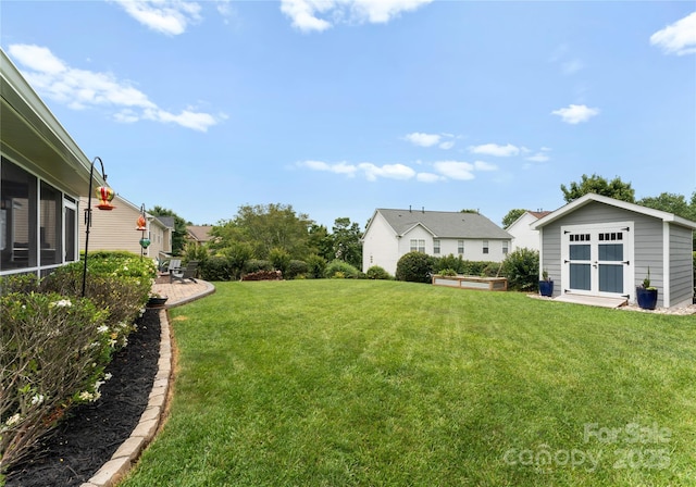 112 Steeplechase Ave, Mooresville, NC 28117 - view of green lawn featuring an outbuilding