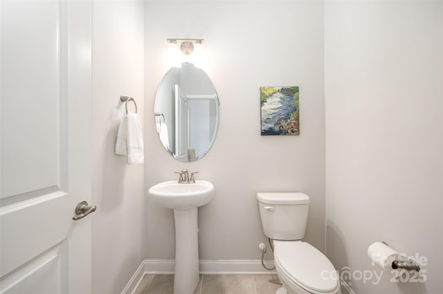 7739 Village Pkwy, Locust, NC 28097 - half bathroom featuring toilet and tile patterned floors