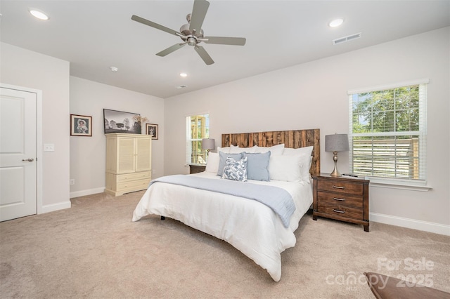 7739 Village Pkwy, Locust, NC 28097 - bedroom with light colored carpet, recessed lighting, and a ceiling fan