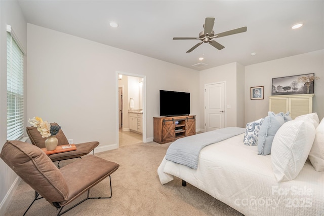 7739 Village Pkwy, Locust, NC 28097 - bedroom with light colored carpet, recessed lighting, ceiling fan, and connected bathroom