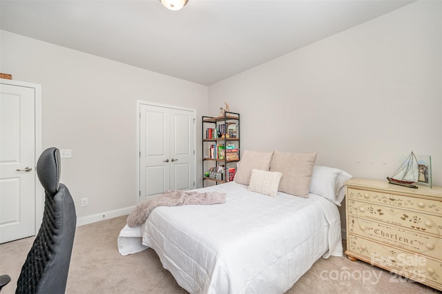 7739 Village Pkwy, Locust, NC 28097 - carpeted bedroom featuring baseboards and a closet