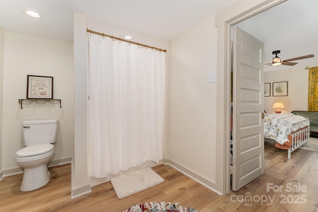 220 Low Water Bridge Rd, Troy, NC 27371 - full bathroom featuring wood finished floors, ceiling fan, connected bathroom, recessed lighting, and a shower with shower curtain