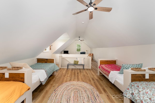 220 Low Water Bridge Rd, Troy, NC 27371 - bedroom featuring vaulted ceiling, wood finished floors, and a ceiling fan