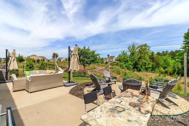4268 Coachwhip Ave, Lancaster, SC 29720 - view of patio / terrace with an outdoor living space with a fire pit