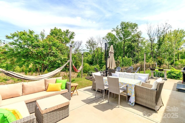 4268 Coachwhip Ave, Lancaster, SC 29720 - view of patio / terrace with outdoor dining area, an outdoor hangout area, and view of scattered trees
