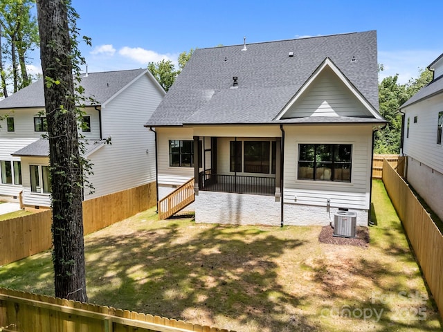 3949 Plainview Rd, Charlotte, NC 28208 - rear view of house with roof with shingles and a fenced backyard
