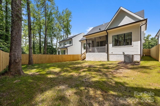 3949 Plainview Rd, Charlotte, NC 28208 - back of property featuring a fenced backyard and a sunroom
