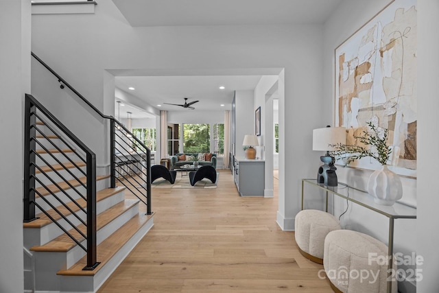 3949 Plainview Rd, Charlotte, NC 28208 - foyer entrance featuring light wood finished floors, stairway, ceiling fan, and recessed lighting
