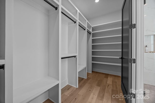 3949 Plainview Rd, Charlotte, NC 28208 - walk in closet featuring wood finished floors