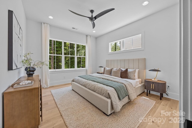 3949 Plainview Rd, Charlotte, NC 28208 - bedroom with light wood-type flooring, recessed lighting, and a ceiling fan