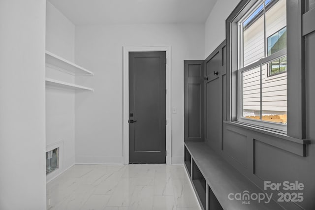 3949 Plainview Rd, Charlotte, NC 28208 - mudroom featuring light marble finish flooring and baseboards
