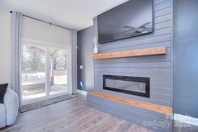 4017 Avis Way, Monroe, NC 28110 - unfurnished living room with a large fireplace and wood finished floors