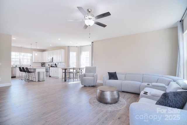 4017 Avis Way, Monroe, NC 28110 - living area with light wood-style flooring, ceiling fan, and recessed lighting