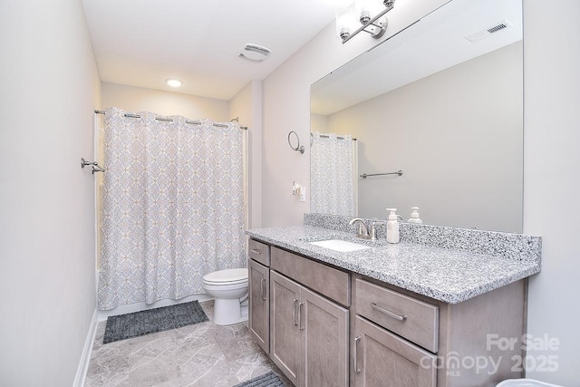 4017 Avis Way, Monroe, NC 28110 - full bathroom featuring vanity, marble look tiles, and a shower with shower curtain