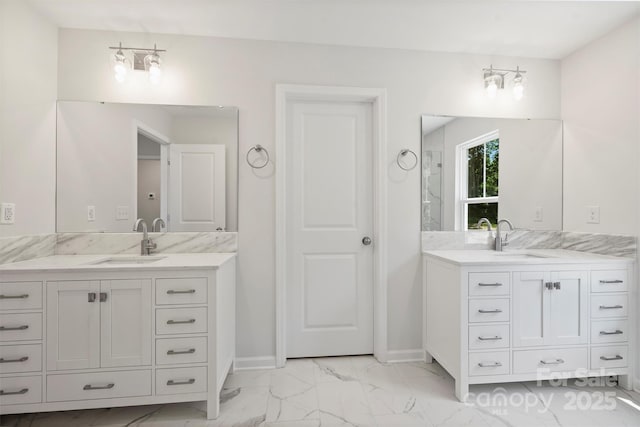 164 Meadow Glen Dr, Troutman, NC 28166 - full bath with marble look tile flooring and two vanities