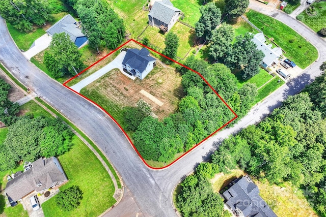 164 Meadow Glen Dr, Troutman, NC 28166 - aerial perspective of suburban area with property parcel outlined