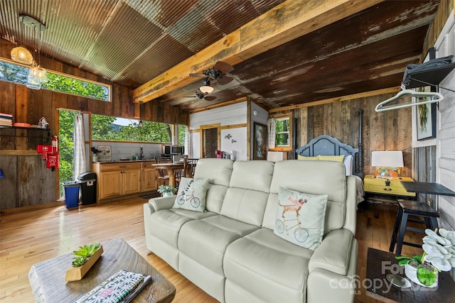 553 Paradise Mountain Rd, Canton, NC 28716 - living area with wooden walls, light wood-type flooring, and a ceiling fan