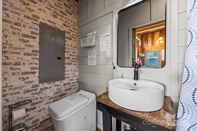 553 Paradise Mountain Rd, Canton, NC 28716 - bathroom featuring electric panel and brick wall