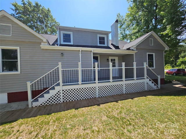 3824 Freedom Dr, Charlotte, NC 28208 - rear view of property with a lawn, a chimney, a porch, and a shingled roof