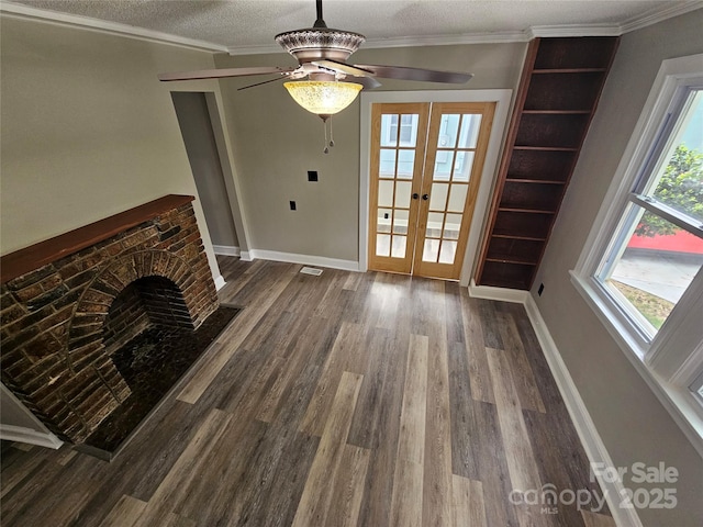 3824 Freedom Dr, Charlotte, NC 28208 - unfurnished living room featuring a ceiling fan, dark wood-type flooring, french doors, and a textured ceiling