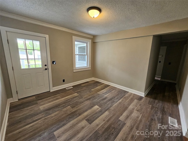 3824 Freedom Dr, Charlotte, NC 28208 - interior space featuring a textured ceiling, healthy amount of natural light, dark wood-type flooring, and crown molding