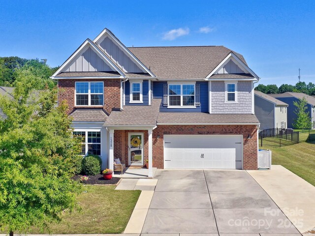 1324 Mona Vale Dr, Huntersville, NC 28078 - view of front of house featuring a shingled roof and brick siding