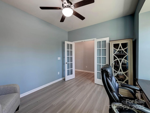 1324 Mona Vale Dr, Huntersville, NC 28078 - office area featuring french doors, light wood-style floors, and a ceiling fan